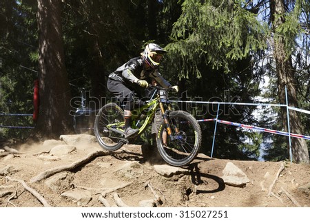 Val Di Sole, Italy - 22 August 2015: Pivot Factory Dh Team rider Kerr Bernard, in action during the mens elite Downhill final World Cup at the Uci Mountain Bike in Val di Sole, Trento, Italy