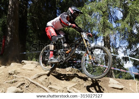 Val Di Sole, Italy - 22 August 2015: Madison Saracen Factory Team rider Simmonds Matthew, in action during the mens elite Downhill final World Cup at the Uci Mountain Bike
