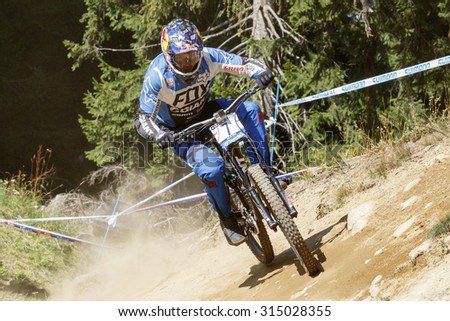 Val Di Sole, Italy - 22 August 2015: Giant Factory Off-Road Team,  Rider Gutierrez Villegas Marcelo in action during the mens elite Downhill final World Cup at the Uci Mountain Bike