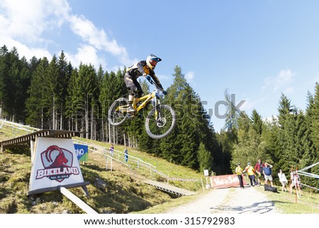 Val Di Sole, Italy - 22 August 2015: Orange Dirt World Team Xfusion rider Atwill Philip, in action during the mens elite Downhill final World Cup at the Uci Mountain Bike in Val di Sole, Trento, Italy