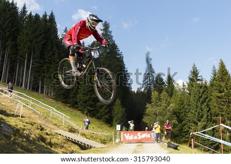 Val Di Sole, Italy - 22 August 2015: Intense Factory Racing Team,  Rider Cometti Luca in action during the mens elite Downhill final World Cup at the Uci Mountain Bike in Val di Sole, Trento, Italy