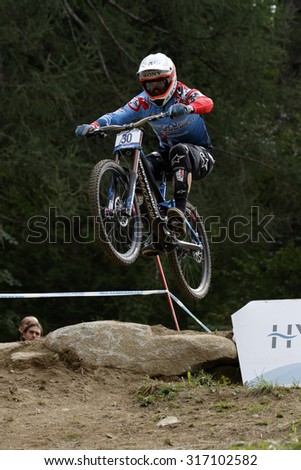 Val Di Sole, Italy - 22 August 2015: Ms Mondraker Team,  Rider Pekoll Markus in action during the mens elite Downhill final World Cup at the Uci Mountain Bike in Val di Sole, Trento, Italy