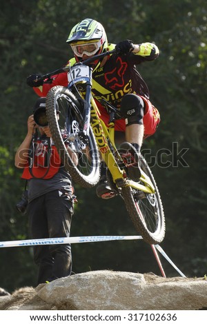 Val Di Sole, Italy - 22 August 2015: Devinci Global Racing Team rider Lucas Dean, in action during the mens elite Downhill final World Cup at the Uci Mountain Bike in Val di Sole, Trento, Italy