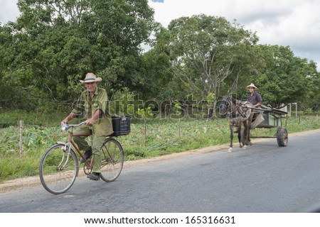 Cuba 19/05/2013: in the countryside is difficult to find cars on the streets. The main means of transportation are bikes and carriages with horses used by the people that works in the fields or plantations