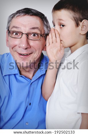 Unbelievable.  Grandson, 8 years with his grandfather and whispers something to him. Grandpa very surprised.