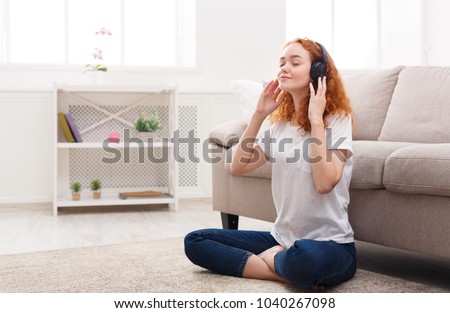 Similar – Image, Stock Photo Cheerful barefoot ginger woman waking up on bed