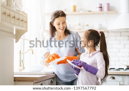 Image, Stock Photo Adult daughter teaching her elderly mother to use laptop