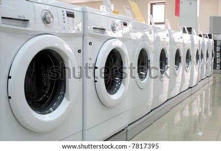 Rows of modern washing machines in a store