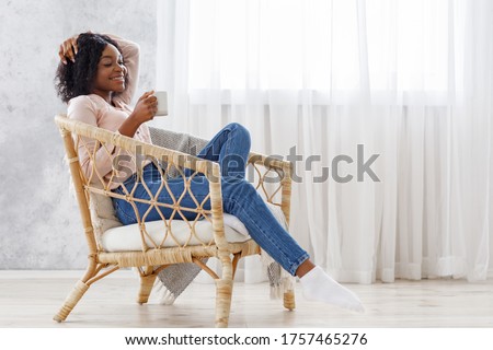 Similar – Image, Stock Photo African American woman sitting at on couch home