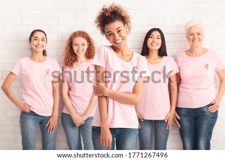 Similar – Image, Stock Photo woman standing with pink strawberries socks