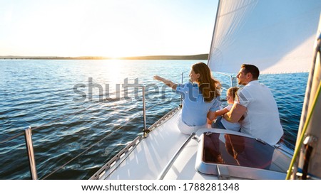 Similar – Image, Stock Photo Person at seaside on cloudy day