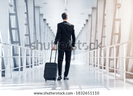 Similar – Image, Stock Photo Stylish businessman with suitcase in city