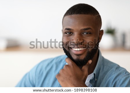 Similar – Image, Stock Photo Handsome Black Man Smiling and Combing Hair in Bathroom