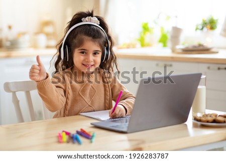 Similar – Image, Stock Photo Little girl preschooler showing painted colourful hands