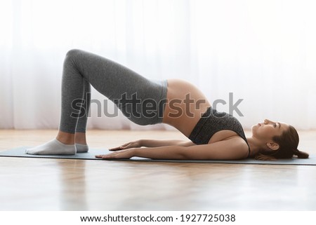 Similar – Image, Stock Photo Pregnant woman doing yoga at home