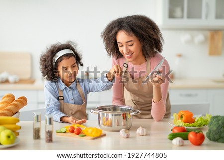 Image, Stock Photo Woman seasoning food with salt