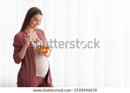 Similar – Image, Stock Photo Nutrition during pregnancy