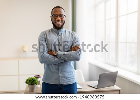 Similar – Image, Stock Photo young african man with a structure at background
