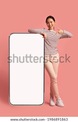 Similar – Image, Stock Photo Woman with smartphone leaning on stone house