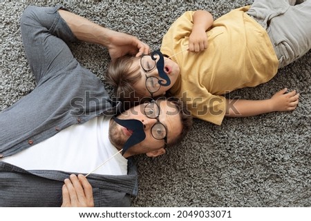 Image, Stock Photo Funny father and son shaving in the bathroom