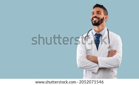 Similar – Image, Stock Photo Arabian man in blue clothes walking on a desert dune.