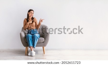 Similar – Image, Stock Photo Positive young lady sitting on bicycle on city street in sunlight