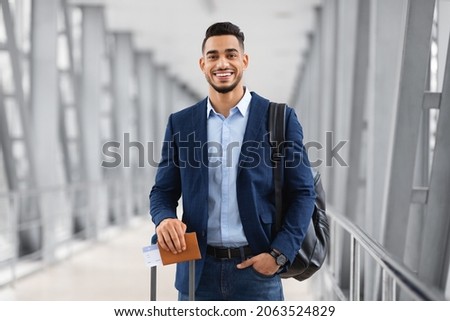 Similar – Image, Stock Photo Tourists with suitcases and masks on the platform next to the train