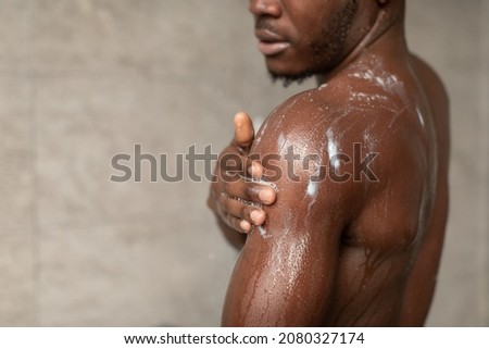 Similar – Image, Stock Photo Man taking shower in wooden bathroom