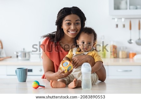 Similar – Image, Stock Photo Baby with Mother looking at the sunset