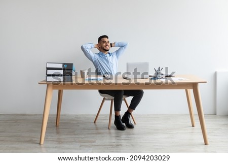 Similar – Image, Stock Photo Young smiling cheerful pleased woman indoors at home kitchen using social media on mobile phone for chatting and staying connected with her loved ones. Stay at home, social distancing lifestyle.