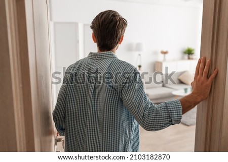 Similar – Image, Stock Photo Unrecognizable man walking on roadside on crossing