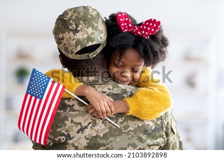 Similar – Image, Stock Photo Girl hugging military man after homecoming