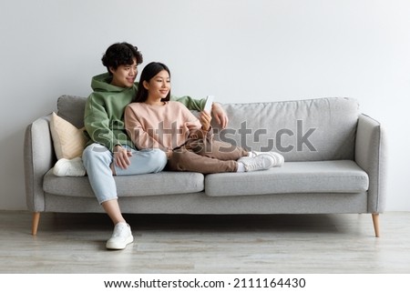 Similar – Image, Stock Photo Happy young married couple spending time together at seaside