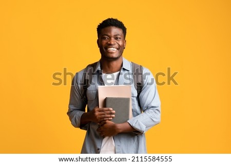 Similar – Image, Stock Photo Black man with book on train platform