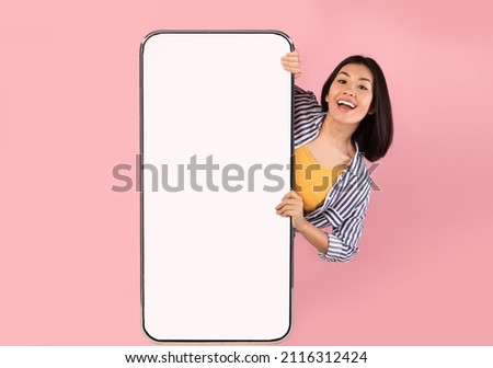 Similar – Image, Stock Photo Asian woman with smartphone making up lips in cafe