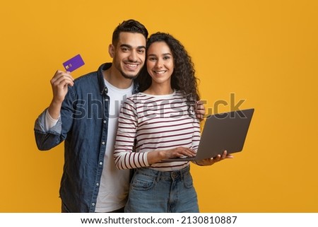 Similar – Image, Stock Photo Cheerful Arab woman with headphones on embankment