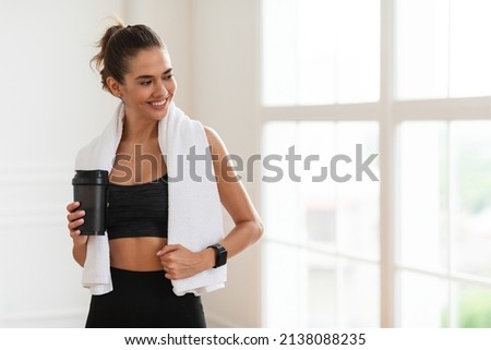 Similar – Image, Stock Photo Young athletic woman exercising at the gym.