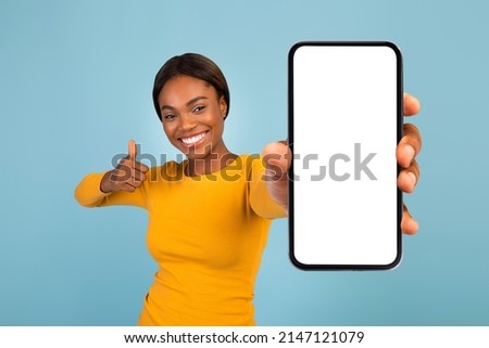 Similar – Image, Stock Photo Glad African American female listened to music from laptop