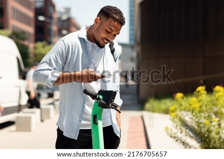 Image, Stock Photo Parking space for e-scooters and bicycles