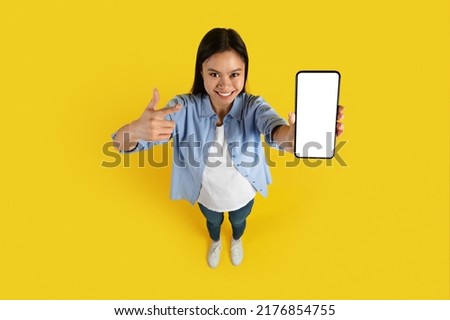 Similar – Image, Stock Photo top view of woman holding metallic mug of water, relaxing in hammock at sunset. autumn season