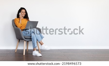 Similar – Image, Stock Photo Positive Arab woman having video call in park