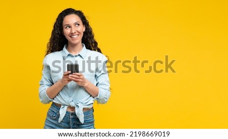 Image, Stock Photo Cheerful Arab woman with headphones on embankment