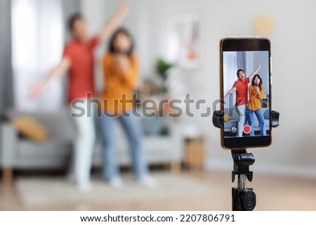 Similar – Image, Stock Photo Couple recording song at home