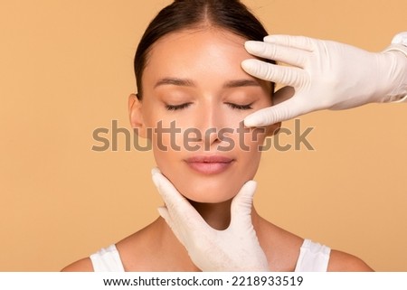 Similar – Image, Stock Photo woman with gloves touching her mask