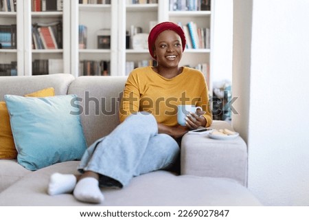 Image, Stock Photo Woman in turban drinking coffee