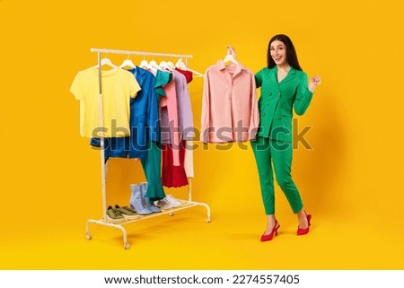 Similar – Image, Stock Photo Woman in colorful clothes with a cardboard box on her head