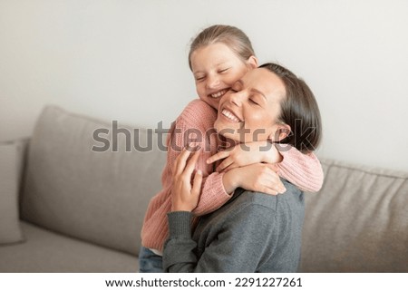 Similar – Image, Stock Photo Mother and cute little son hugging outdoors