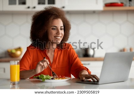 Similar – Image, Stock Photo Woman browsing laptop during online shopping at home