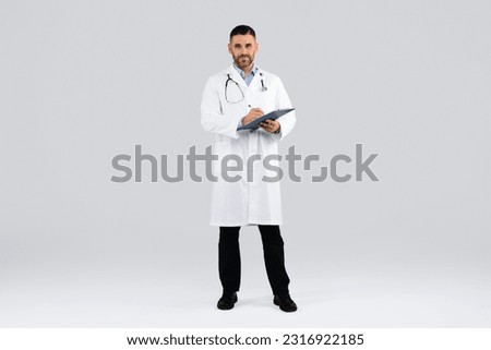 Similar – Image, Stock Photo doctor man working on laptop. Corona virus test on table. Covid-19 concept