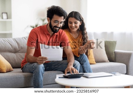 Similar – Image, Stock Photo Happy couple looking at each other on beach